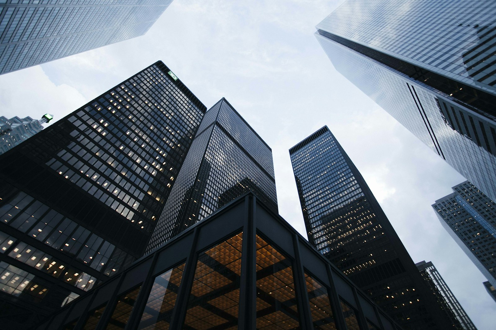 Glass commercial towers, illustrating building energy management.