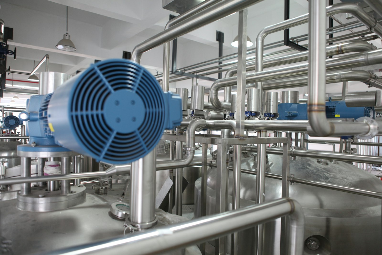 Industrial plant and piping, illustrating industrial energy monitoring.